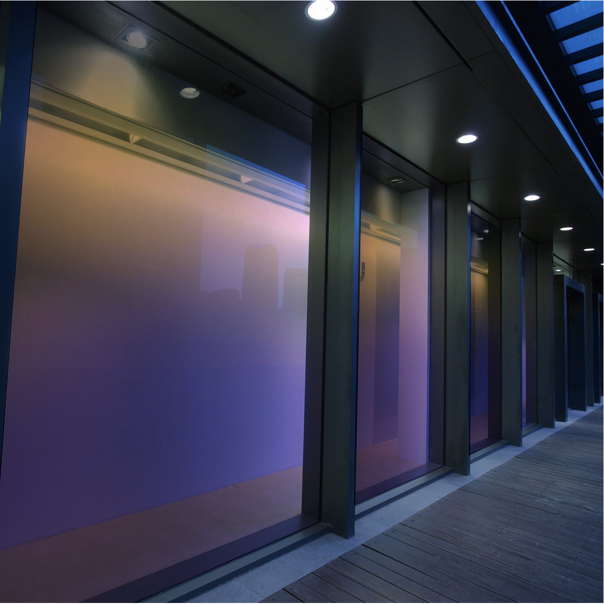 Glazing films and window coverings enhance glazed spaces.